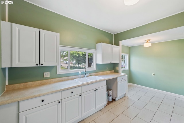 1296 W Central Blvd, Coquille, OR 97423 - kitchen featuring white cabinets, light countertops, and healthy amount of natural light