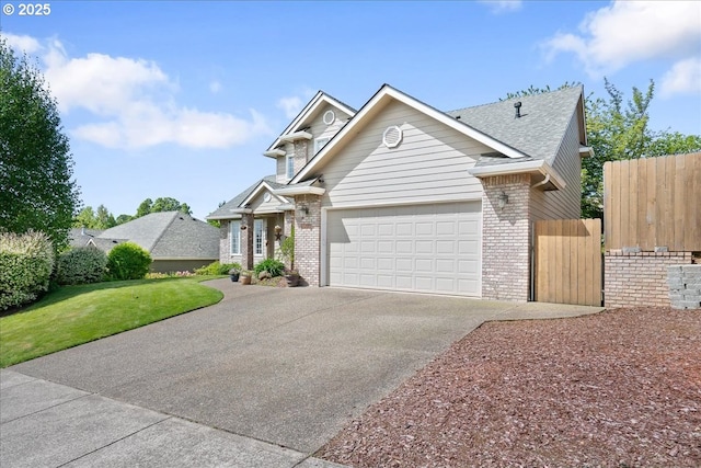 5277 Landon St, Salem, OR 97306 - traditional home with brick siding, driveway, a garage, and roof with shingles