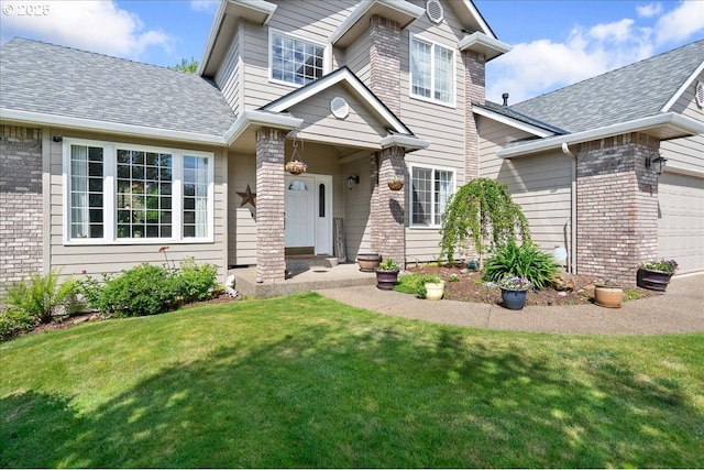 5277 Landon St, Salem, OR 97306 - traditional-style house with a front lawn, an attached garage, brick siding, and roof with shingles