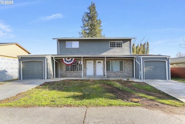 front of property featuring a garage and a porch