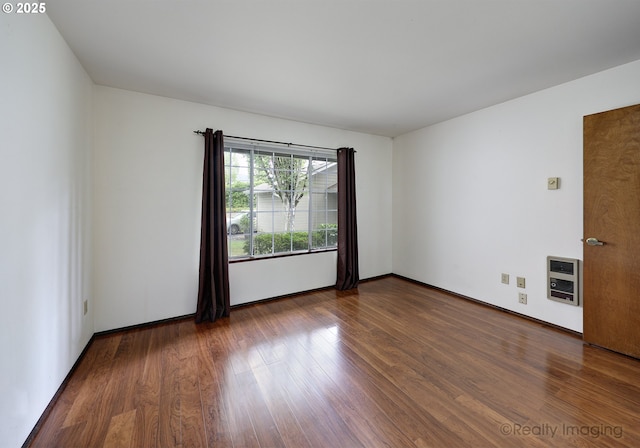 13775 SW Scholls Ferry Rd Unit 16, Beaverton, OR 97008 - unfurnished room with heating unit and wood finished floors