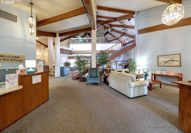 13775 SW Scholls Ferry Rd Unit 16, Beaverton, OR 97008 - carpeted living room with high vaulted ceiling, beamed ceiling, a chandelier, and stairway