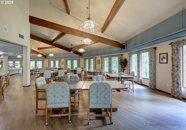 13775 SW Scholls Ferry Rd Unit 16, Beaverton, OR 97008 - dining space with wood finished floors, plenty of natural light, and a chandelier