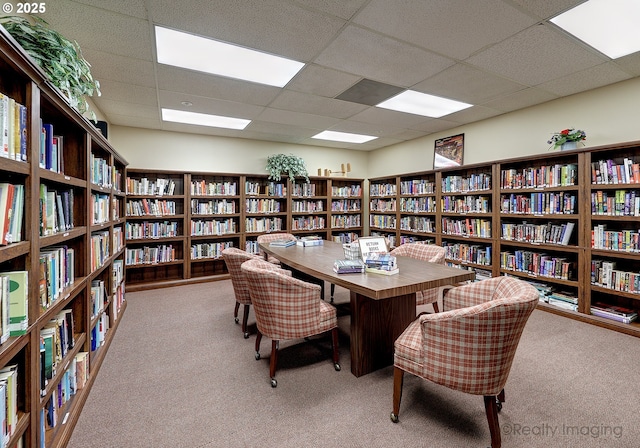 13775 SW Scholls Ferry Rd Unit 16, Beaverton, OR 97008 - home office with wall of books, carpet floors, and a drop ceiling
