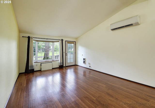 13775 SW Scholls Ferry Rd Unit 16, Beaverton, OR 97008 - unfurnished room with a wall mounted AC, lofted ceiling, dark wood-type flooring, and heating unit