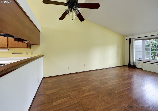 13775 SW Scholls Ferry Rd Unit 16, Beaverton, OR 97008 - unfurnished living room featuring lofted ceiling, dark wood-type flooring, and a ceiling fan