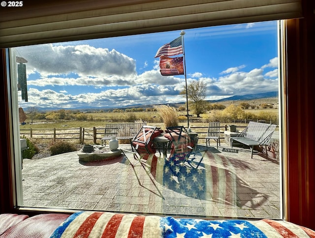 view of patio / terrace featuring a rural view