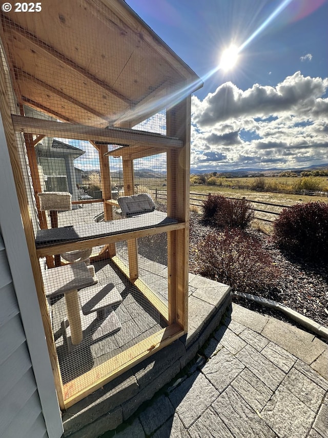 view of patio with a rural view