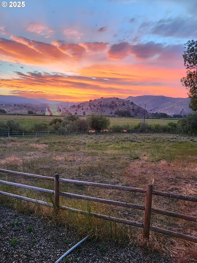 property view of mountains featuring a rural view