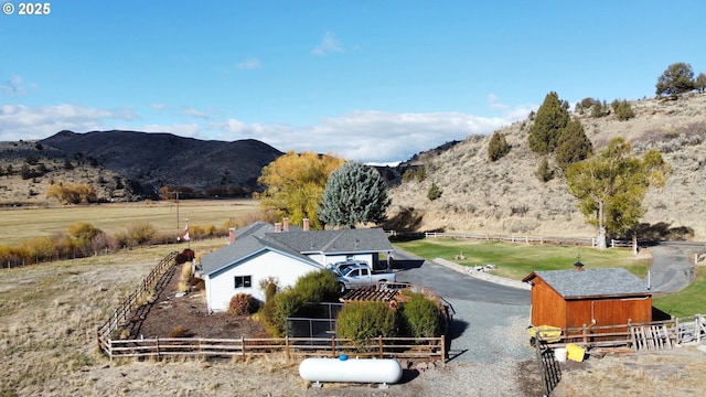 property view of mountains featuring a rural view