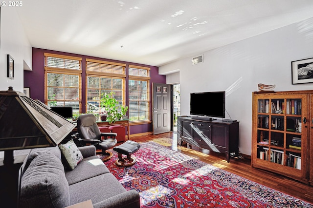 living area featuring wood finished floors