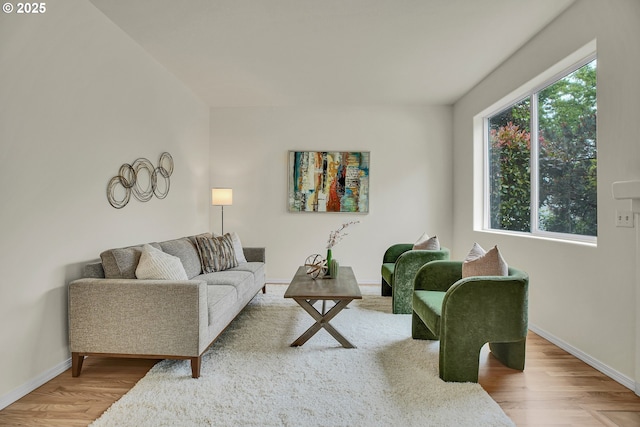 697 NW Rubus Ln, Hillsboro, OR 97124 - living area featuring wood finished floors and baseboards