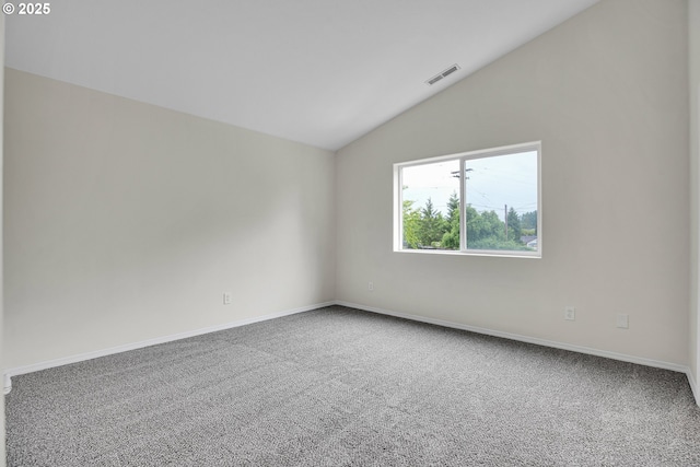 697 NW Rubus Ln, Hillsboro, OR 97124 - empty room with lofted ceiling, carpet floors, and baseboards