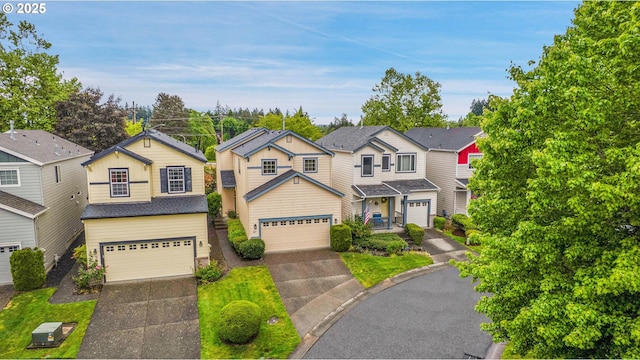 697 NW Rubus Ln, Hillsboro, OR 97124 - traditional-style home with a residential view and driveway