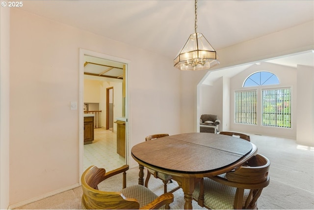 20916 SW Siletz Ct, Tualatin, OR 97062 - dining space featuring light carpet, a chandelier, and lofted ceiling