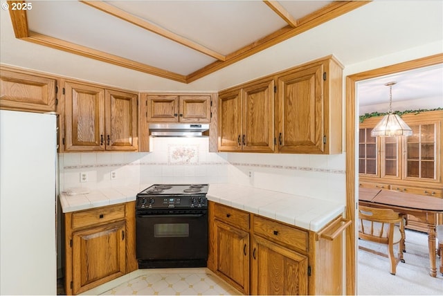 20916 SW Siletz Ct, Tualatin, OR 97062 - kitchen featuring black electric range, under cabinet range hood, freestanding refrigerator, and tasteful backsplash