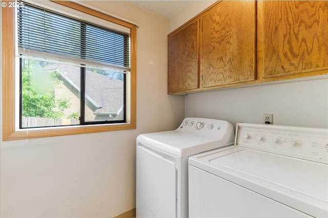 20916 SW Siletz Ct, Tualatin, OR 97062 - laundry room featuring washing machine and dryer and cabinet space