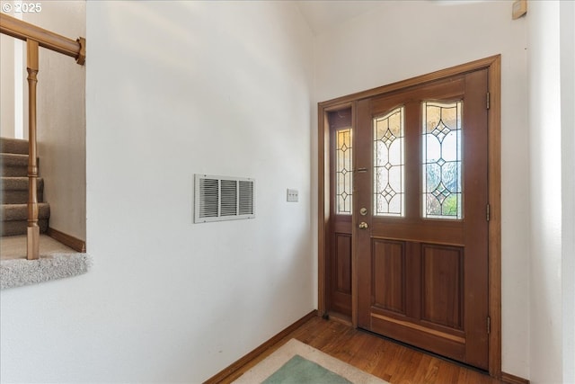 20916 SW Siletz Ct, Tualatin, OR 97062 - entrance foyer with stairway and wood finished floors