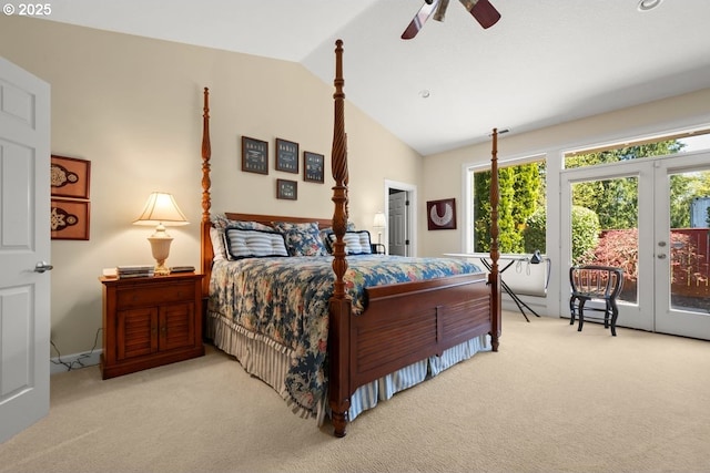 bedroom featuring access to exterior, multiple windows, lofted ceiling, and carpet floors