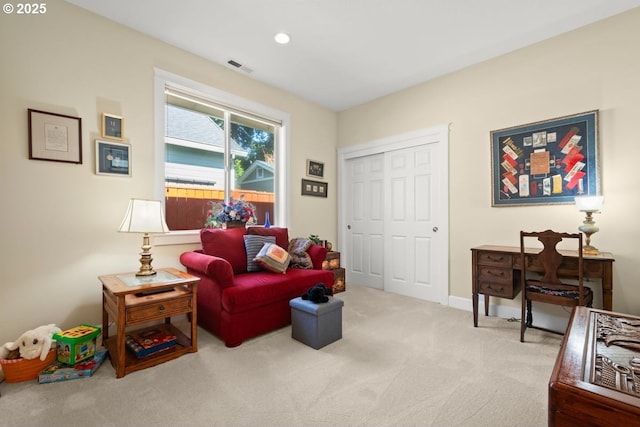 sitting room featuring carpet flooring, visible vents, and recessed lighting