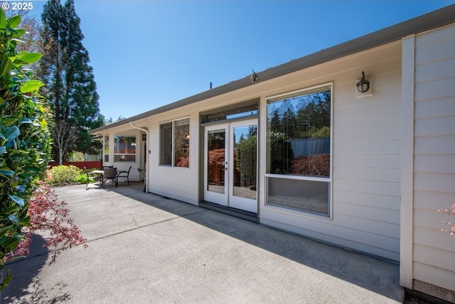 doorway to property with a patio and french doors