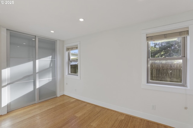 empty room featuring light hardwood / wood-style floors