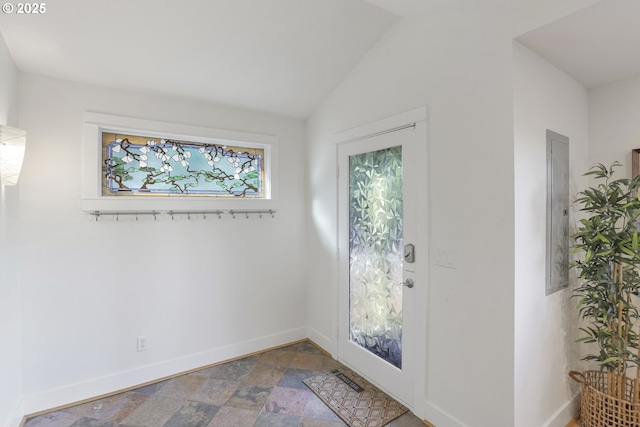 entryway featuring vaulted ceiling