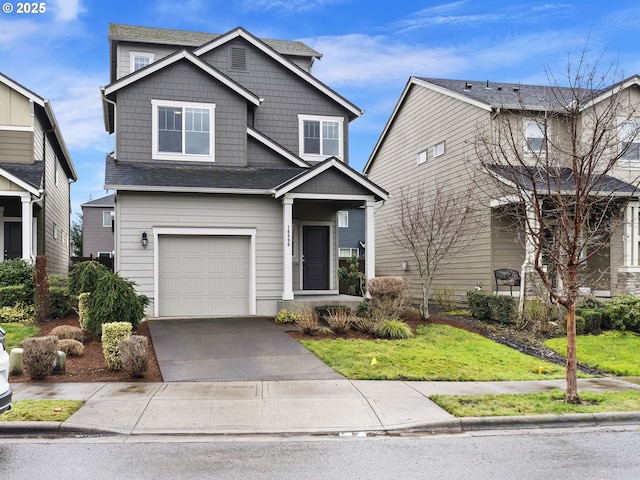 craftsman-style house featuring a garage