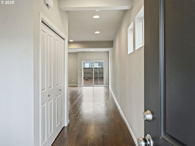 corridor featuring dark hardwood / wood-style flooring