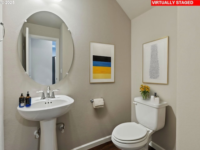 bathroom featuring toilet