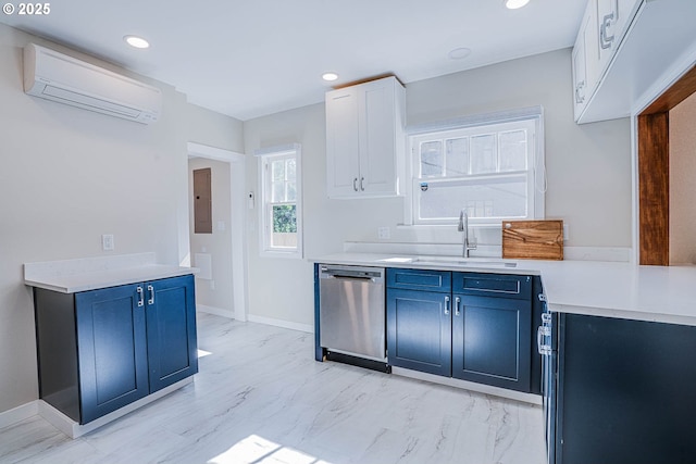 kitchen featuring a wall mounted air conditioner, white cabinetry, dishwasher, sink, and blue cabinetry