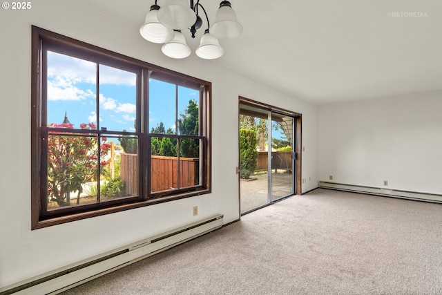 12665 SW Prince Edward Ct Unit A, Portland, OR 97224 - carpeted empty room featuring a baseboard radiator, a chandelier, and a baseboard heating unit
