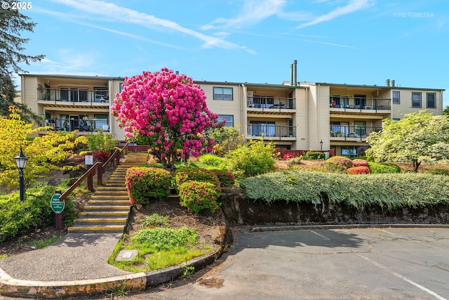 12665 SW Prince Edward Ct Unit A, Portland, OR 97224 - view of apartment building / complex featuring stairway