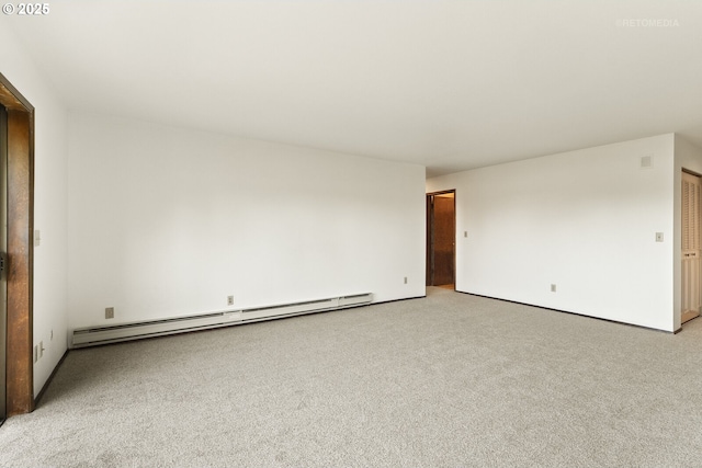 12665 SW Prince Edward Ct Unit A, Portland, OR 97224 - spare room with a baseboard radiator and light colored carpet