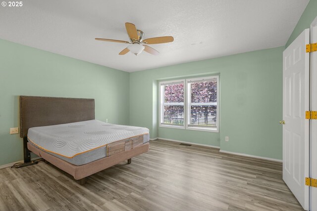 1255 NE 17th Ave, Hillsboro, OR 97124 - bedroom with wood finished floors and ceiling fan