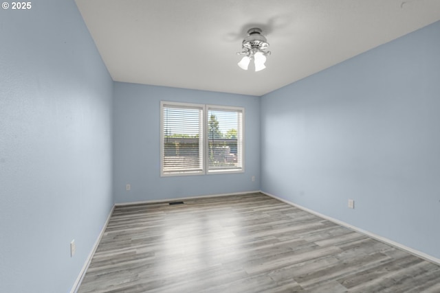 1255 NE 17th Ave, Hillsboro, OR 97124 - empty room featuring wood finished floors and a ceiling fan