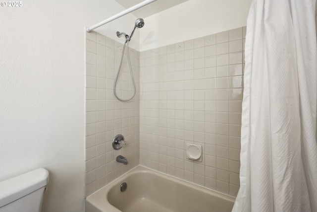 full bath featuring shower / bath combination with curtain and toilet