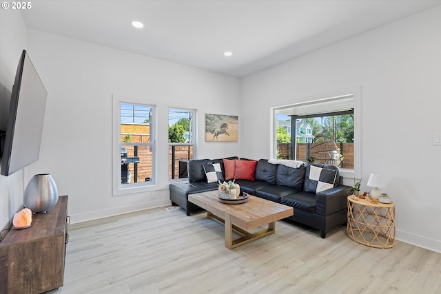 8007 N Hudson St, Portland, OR 97203 - living room with light wood-style floors, healthy amount of natural light, and recessed lighting