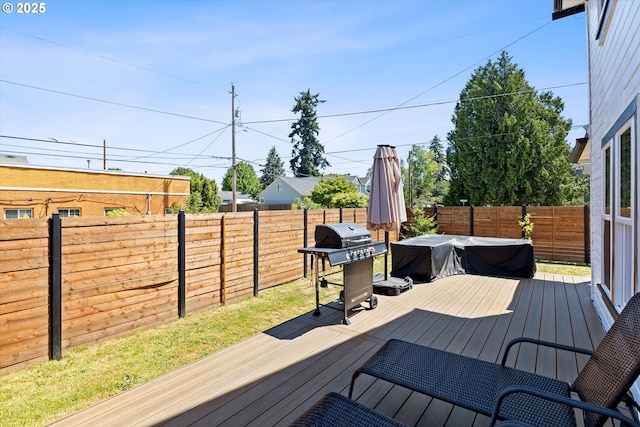 8007 N Hudson St, Portland, OR 97203 - wooden deck featuring a grill and a fenced backyard