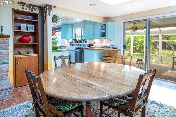 855 E 39th Ave, Eugene, OR 97405 - dining area featuring wood finished floors and a ceiling fan