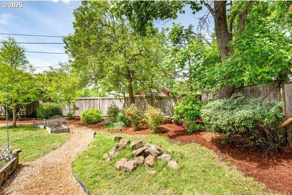 855 E 39th Ave, Eugene, OR 97405 - fenced backyard with a vegetable garden
