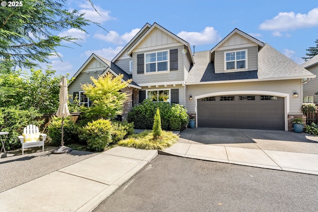 19294 Boulder Run Ct, Oregon City, OR 97045 - craftsman house featuring board and batten siding, a shingled roof, driveway, and an attached garage