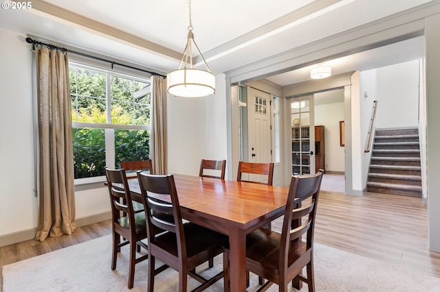19294 Boulder Run Ct, Oregon City, OR 97045 - dining space featuring light wood-style flooring and stairway