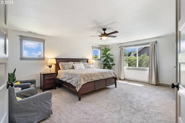 19294 Boulder Run Ct, Oregon City, OR 97045 - bedroom featuring carpet floors, a textured ceiling, and ceiling fan