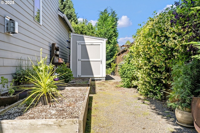 19294 Boulder Run Ct, Oregon City, OR 97045 - view of yard with a storage shed and a garden