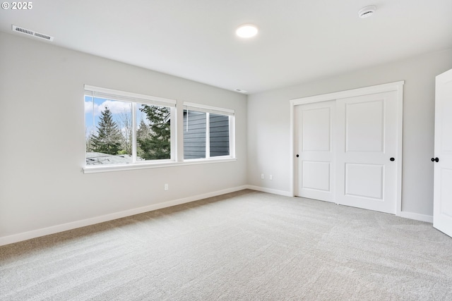 21190 SW Ortiz Ln, Beaverton, OR 97003 - unfurnished bedroom with baseboards, visible vents, carpet, and a closet