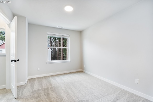 21190 SW Ortiz Ln, Beaverton, OR 97003 - carpeted spare room with a wealth of natural light, baseboards, and visible vents