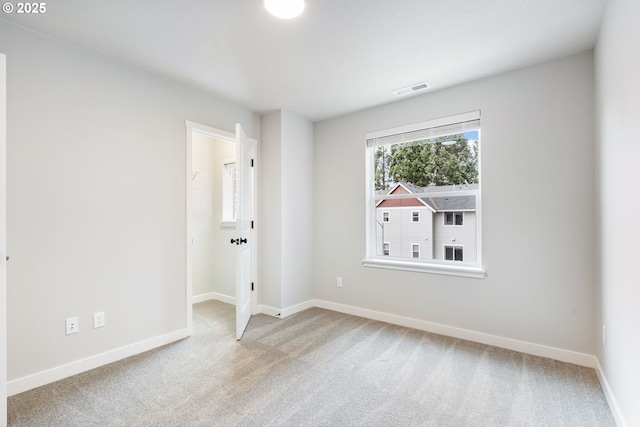21190 SW Ortiz Ln, Beaverton, OR 97003 - carpeted spare room with baseboards and visible vents