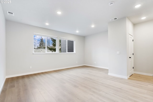 21190 SW Ortiz Ln, Beaverton, OR 97003 - unfurnished room with baseboards, light wood finished floors, visible vents, and recessed lighting