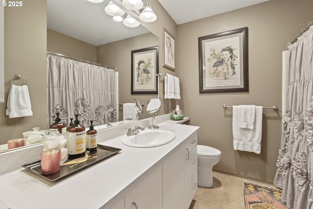 full bath with toilet, vanity, a chandelier, tile patterned flooring, and baseboards